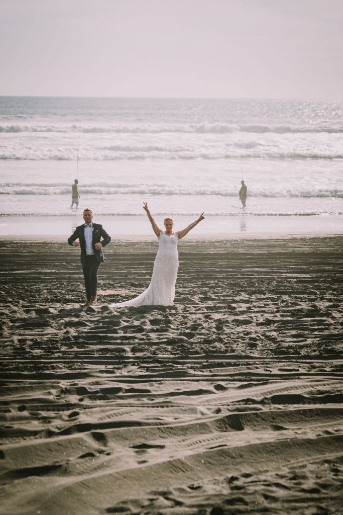 Real Bride Jamielle wearing her Custom Harriett Falvey Wedding Dress and Veil Made in New Zealand